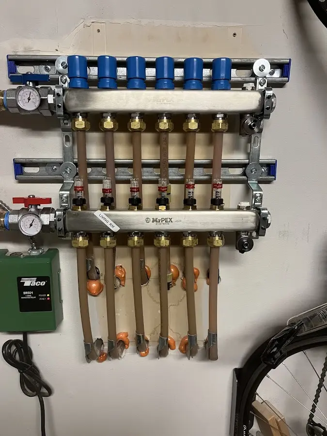 Plumber performing Gas Leak Detection at a residential property in Harrisville